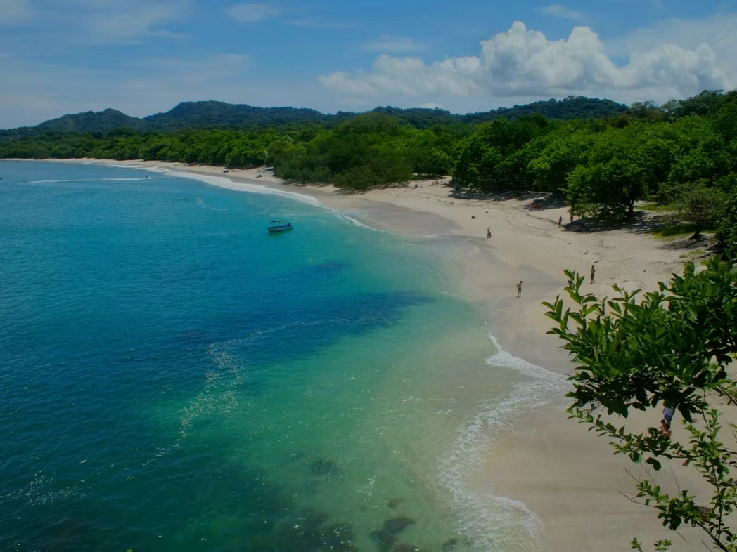 Aerial view pristine tropical beach turquoise water Viva Adventures destination Costa Rica