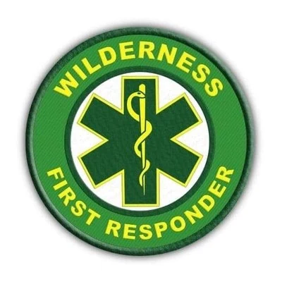 Wilderness First Responder certification badge in green